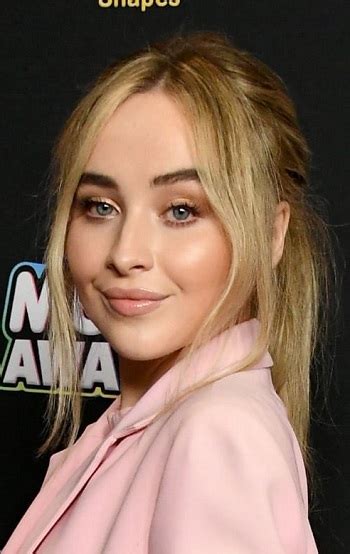 Sabrina Carpenter Appears in Flirty Versace Photos